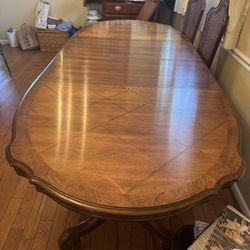 Vintage oval wood dining table