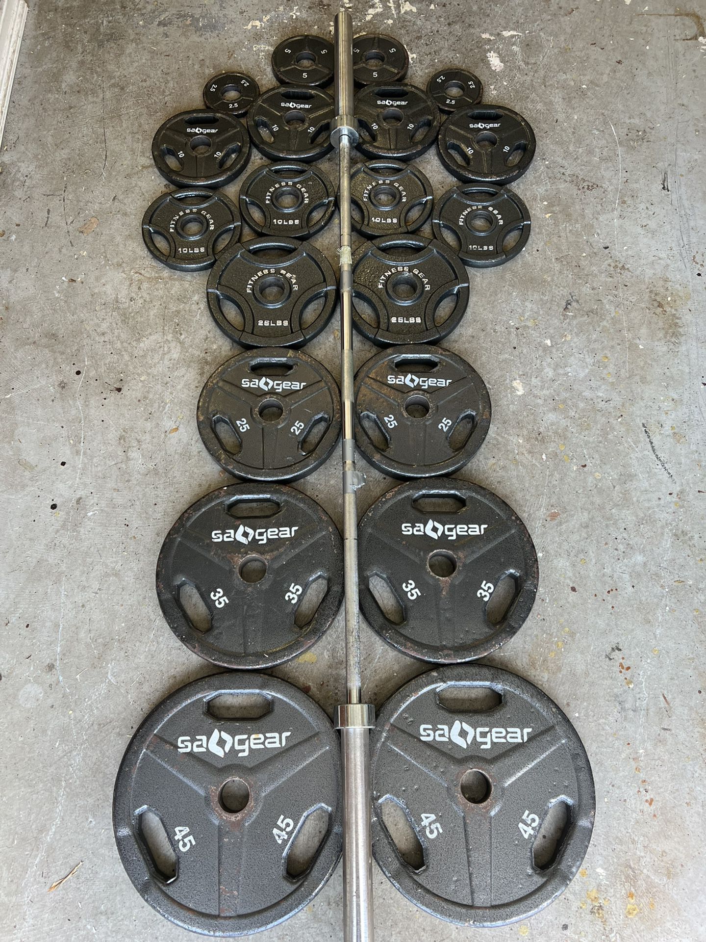 355 Pounds Olympic Weight Plates And 45 Pound Bar