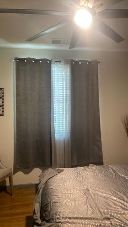 Curtains with curtain rod.
