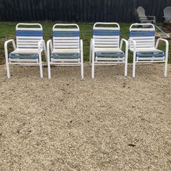 OUTDOOR  CHAIRS -  WHITE & BLUE  VINYL  COLOR - I HAVE 4 - $15  EACH OR $50 IF YOU WANT ALL  4 !!!!!!!