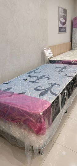 New twin mattress and box spring 2 pc bed frame is not included