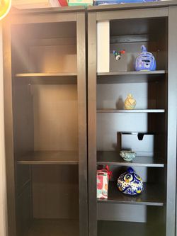 Two black shelves