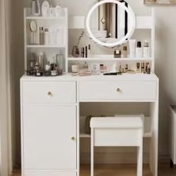 Dressing table with a mirror featuring built-in lighting.