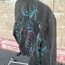 Black, jean jacket with design