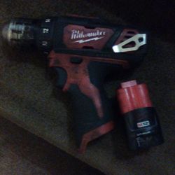 Milwaukee Red lithium M12  3/8 Driver And DeWalt 20v Max Impact Driver And Battery