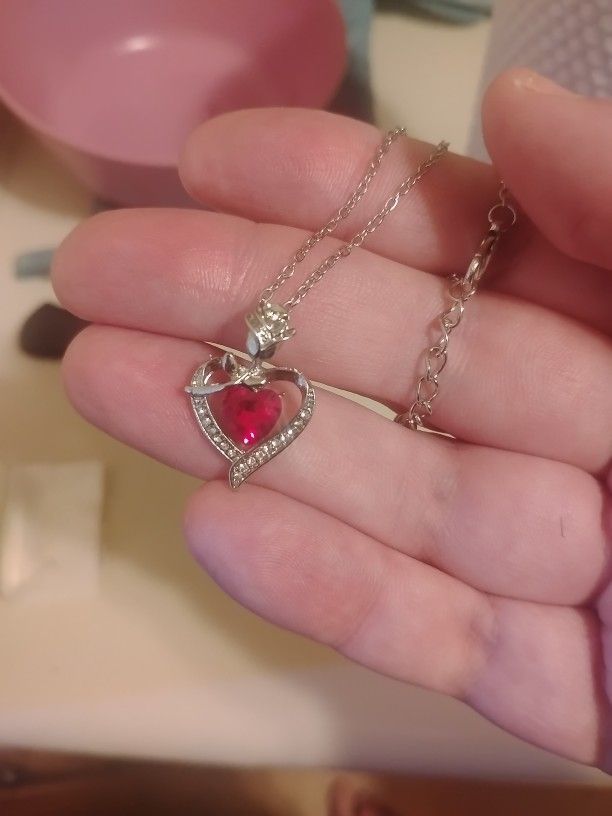 A Beautiful Rose And Heart Necklace