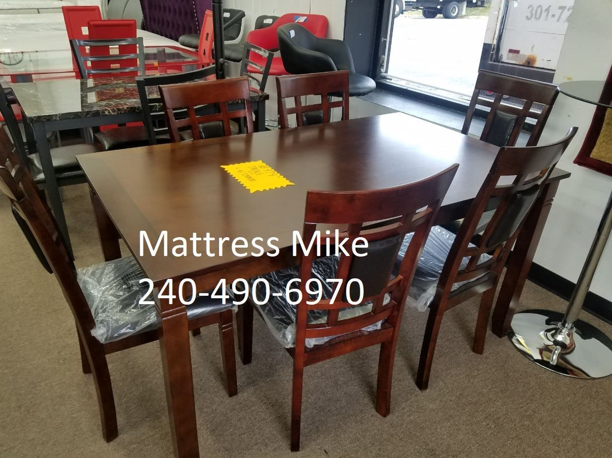 New in box 7pc dining table wood material special 