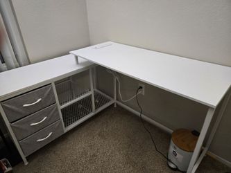 White L-Shaped desk with drawers and power outlets