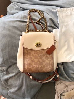 Coach-cross body strap purse