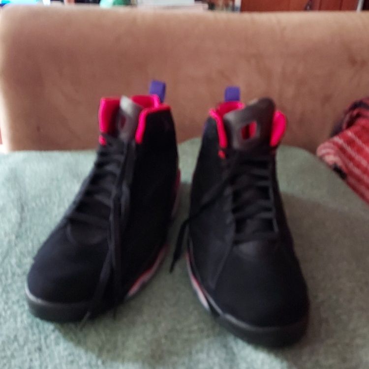 A pair of michael jordan shoes 13 