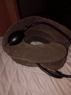 Inflatable neck decompression pillow.