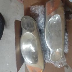 Headlights 2004-06 Chrysler Sebring