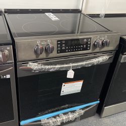 New Scratch And Dent Frigidaire Gallery 5 Burner Glass Top Black Stainless Steel Slide In Range. 1 Year Warranty 