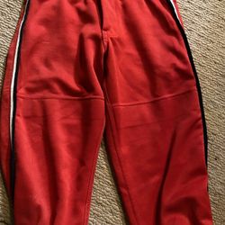 Red Softball Pants With White And Black Piping