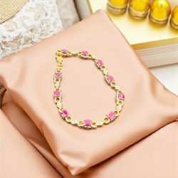 14K YELLOW LINK BRACELET WITH RUBY