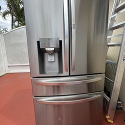 Gray Stand and Still Refrigerator 