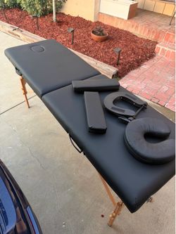 Massage table