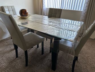 Dining table glass and four chairs