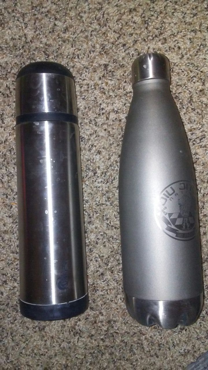 2 thermos containers. New never had liquid in them