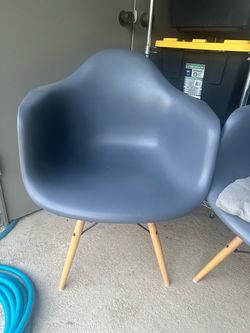 Eames style plastic molded chairs.