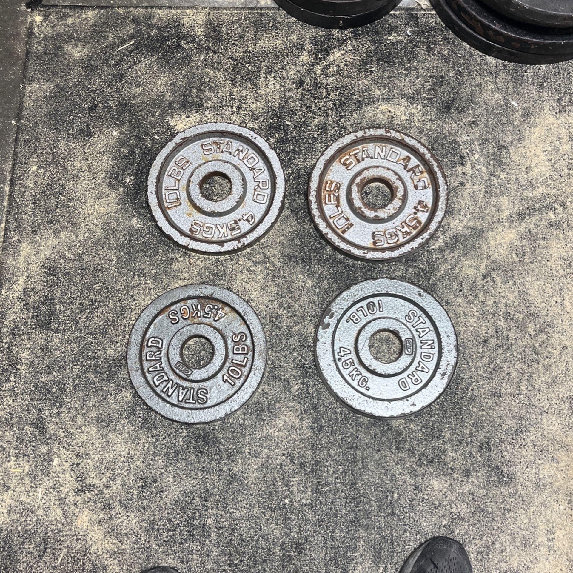 Four 2 Inch 10 Pound Olympic Plates