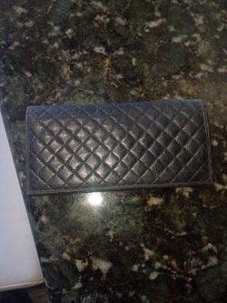 chanel pocket book.  black, lamb skin