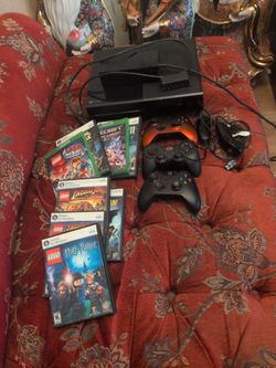 X box  with 5 controllers and 8 games