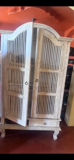 Beautiful bird cage armoire