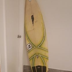Johnney b surfboard 6' 3" good condition with fins and leash and Dakin foot