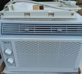 Air  Conditioner,  5k BTUs.  Window type.