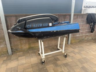Kawasaki js550 jet ski 90’s black and blue jetski standup racing river lake stand up  Hull and dolly trailer Feel free to ask any questions Thanks!