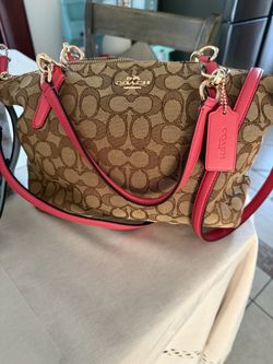 Coach Signature Handbag with Red Leather Trim