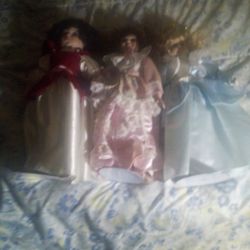 Three Porcelain Dolls $20 Each , Or$40for All Three