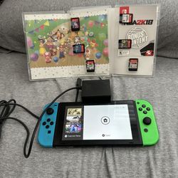 Nintendo Switch With Charger And Multiple Games 