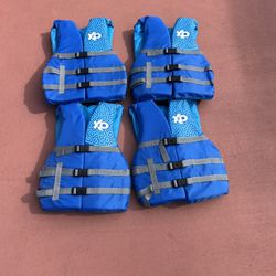 4 Life Jackets Boating Water Sports