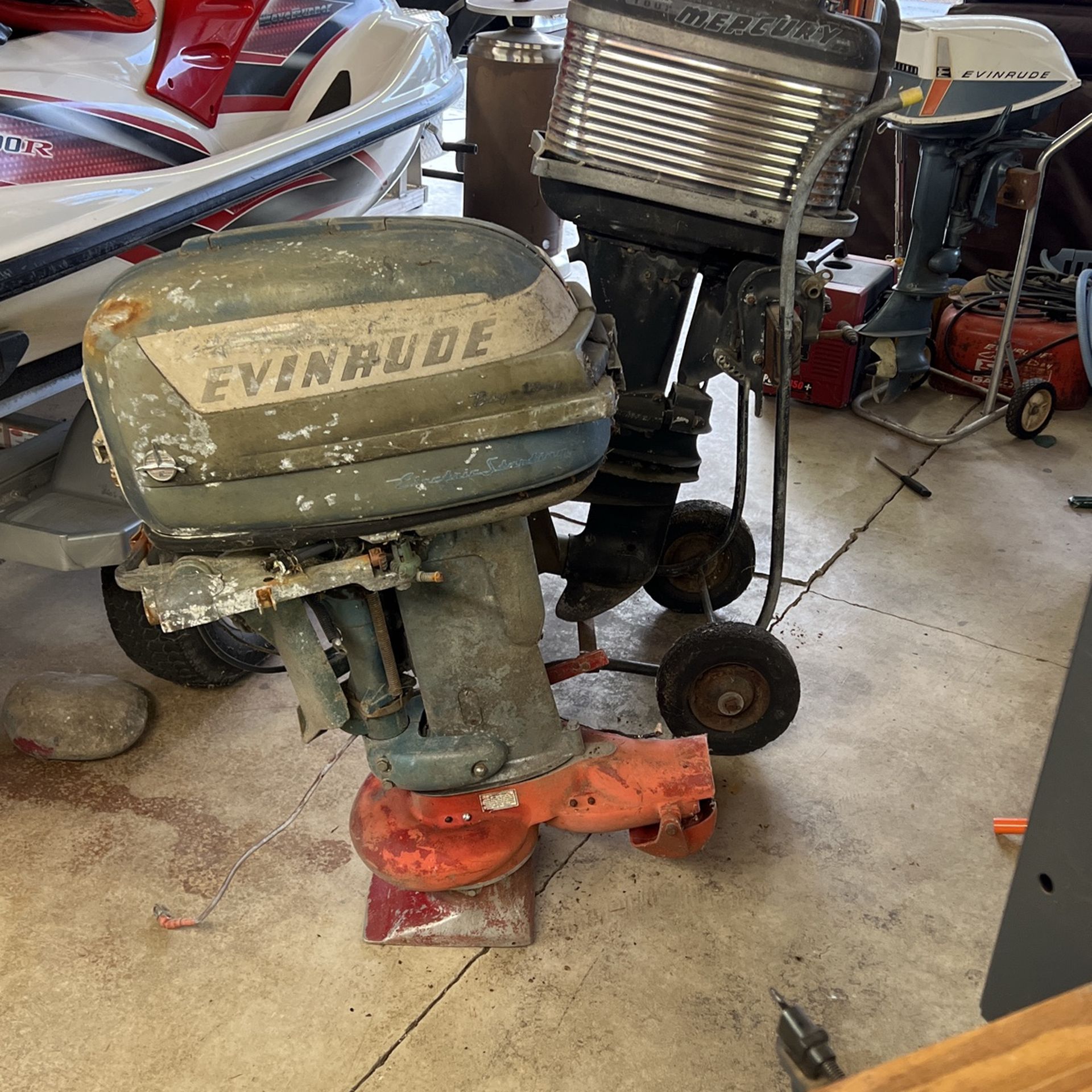 vintage Mercury Mark 55 outboard motor & Evinrude Venture Big-Twin