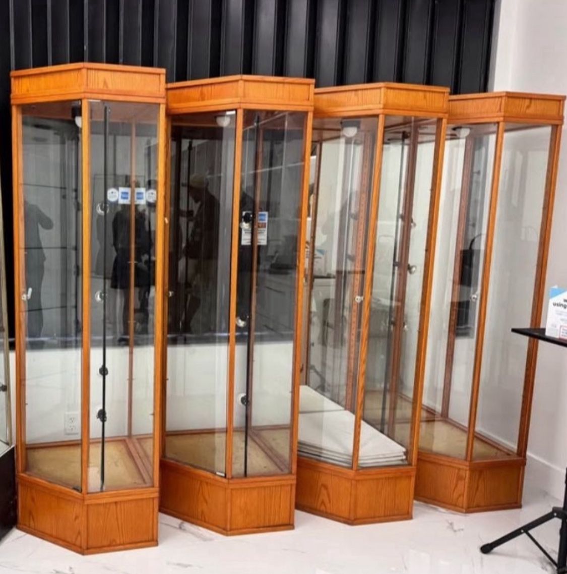 4 Showcases Glass Shelves On Wheels 74.5”Hx22”x22” approximately 30”L