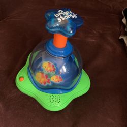 Bright Start Press And Glow Spinner