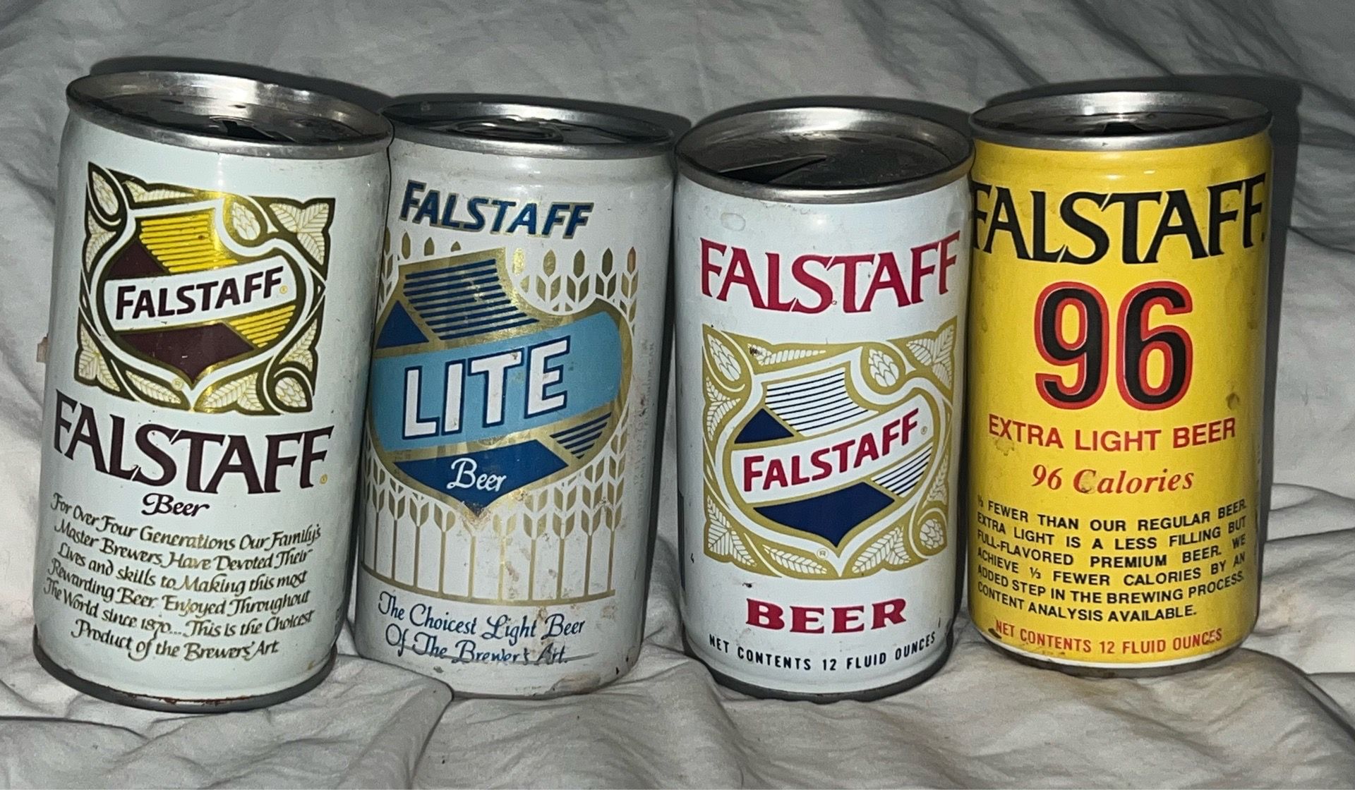 Collectors Vintage Falstaff different year cans