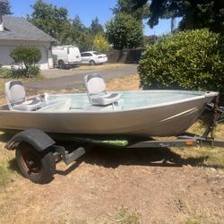 Smoker craft 12 Boat with Calkins Trailer and Minn Kota 