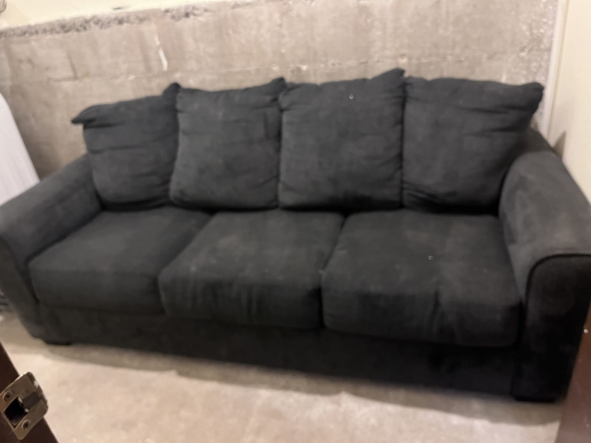 Black Cloth Couch Used. $140 Obo