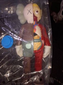 The KAWS Companion "Flayed" (Open Edition) vinyl figure in brown was released by Medicom Toy in 2016, standing roughly 11 to 12 inches tall and featur