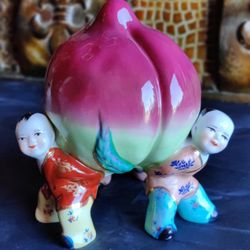 RARE PORCELAIN PEACH STATUE
