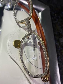 Millionaire Celebrity Glasses “Look Like Money” One (1) Unisex wooden frame with sparkling lab, diamond ice trim. Comes with a white protective case f