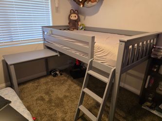 Twin loft bed frame, with slideout desk $180 Firm. Mattress free but no obligation..  No delivery.