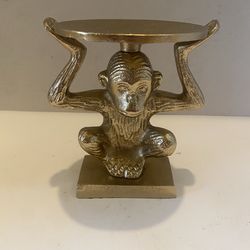 Metal monkey metal pillar candle holder. 5.5 inch tall x 5 wide x 4 inch surface. Vintage/ tropical