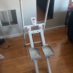 Merach Step Elliptical machine
