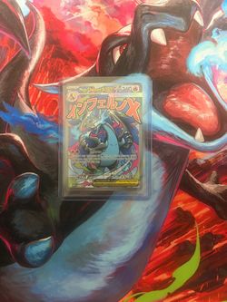 Mega Charizard X EX Pokémon Card in Sleeve