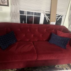 Two sofas in excellent condition, made of navy blue and burgundy velvet