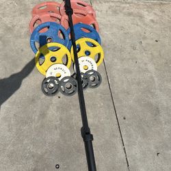 Olympic weights set 330lbs total plus 7ft 45lbs bar